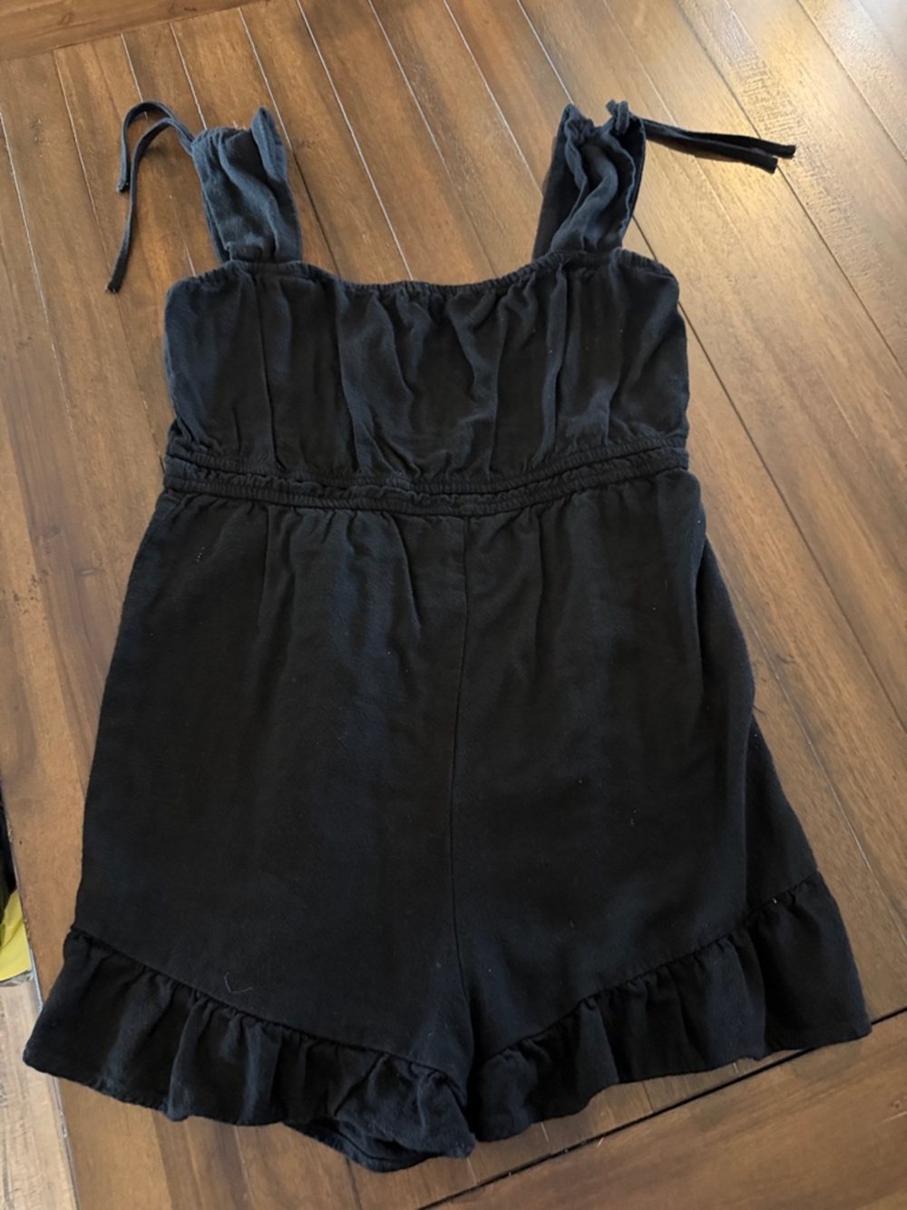 Black Ruffle-Hem Tie-Shoulder Romper